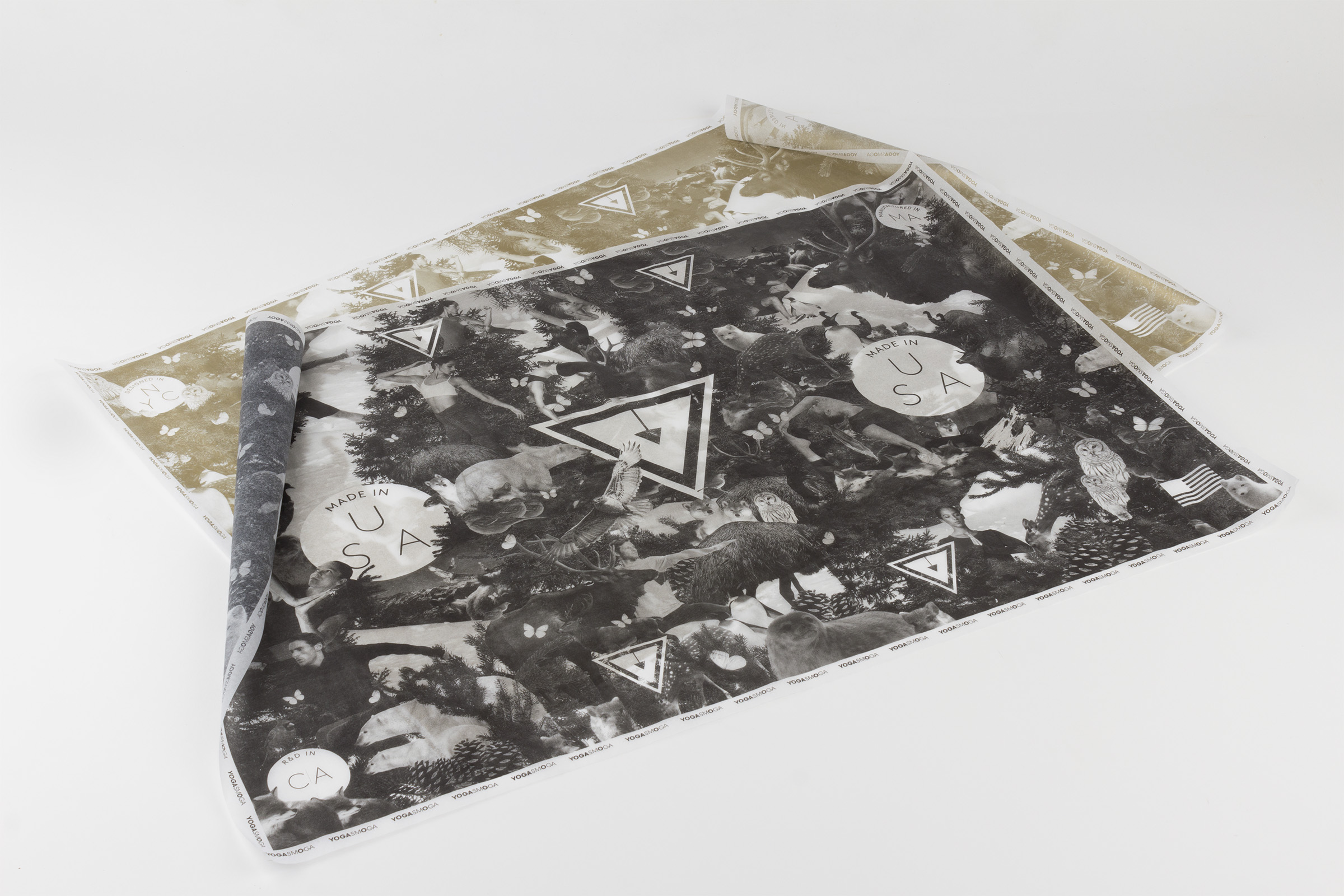 Gold and Black wrapping papers that depict a collage of animals and the YS logo.
